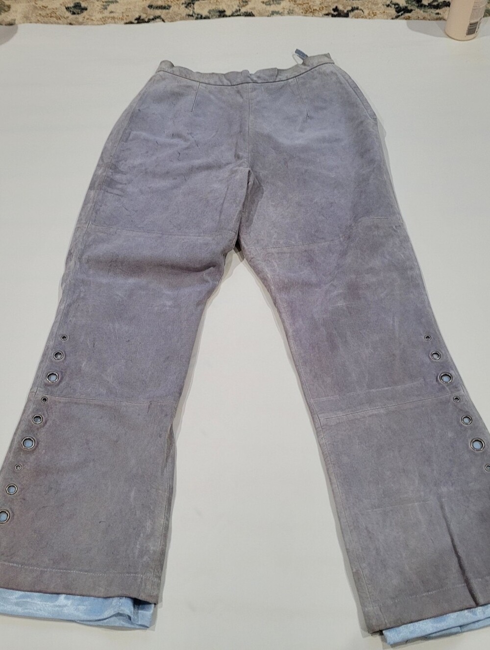 Pamela McCoy blue suede leather pants with grommet details